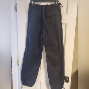 Black cargo parachute pants